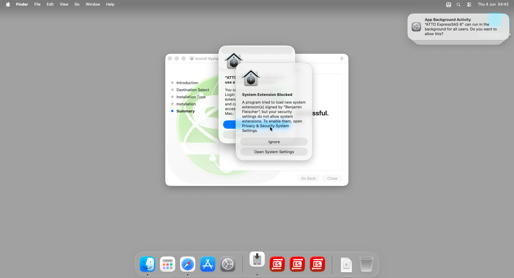 macOS System Extension Blocked notification: 'A program tried to load new system extension(s) signed by Integrated Device Technology, Inc.' with Ignore and Open System Settings buttons