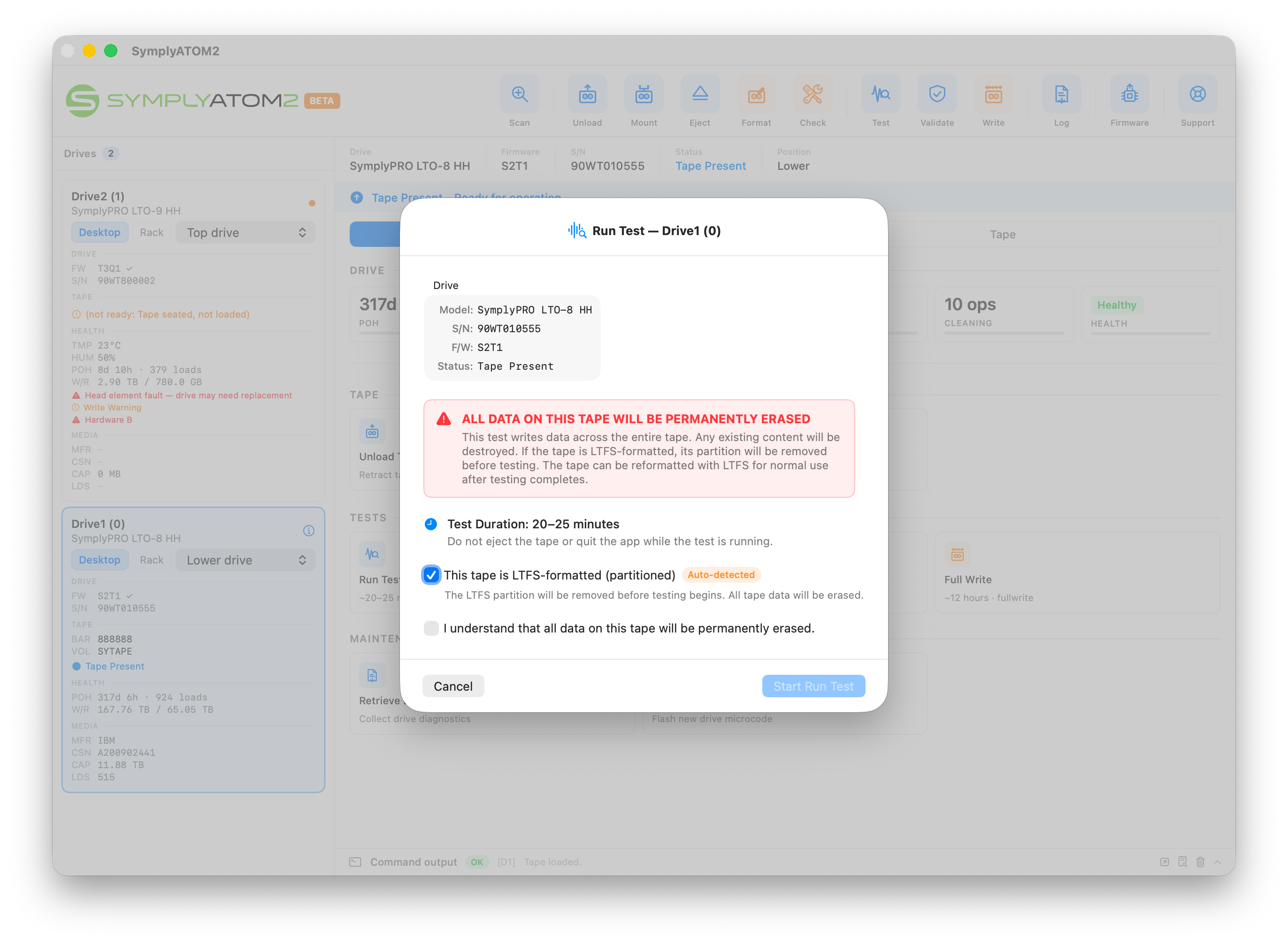 Run Test confirmation dialog showing drive details and data erasure warning with acknowledgement checkbox unchecked