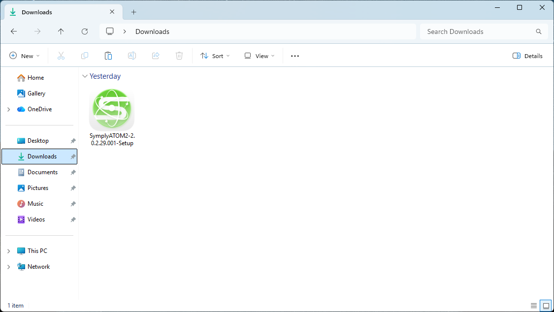 Windows Explorer Downloads folder showing the SymplyATOM2 Setup installer file